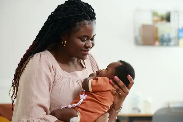 woman holding a baby